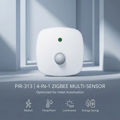 PIR313-Z ZigBee multi-sensor on a white background, a square white case with a green LED and dome lens