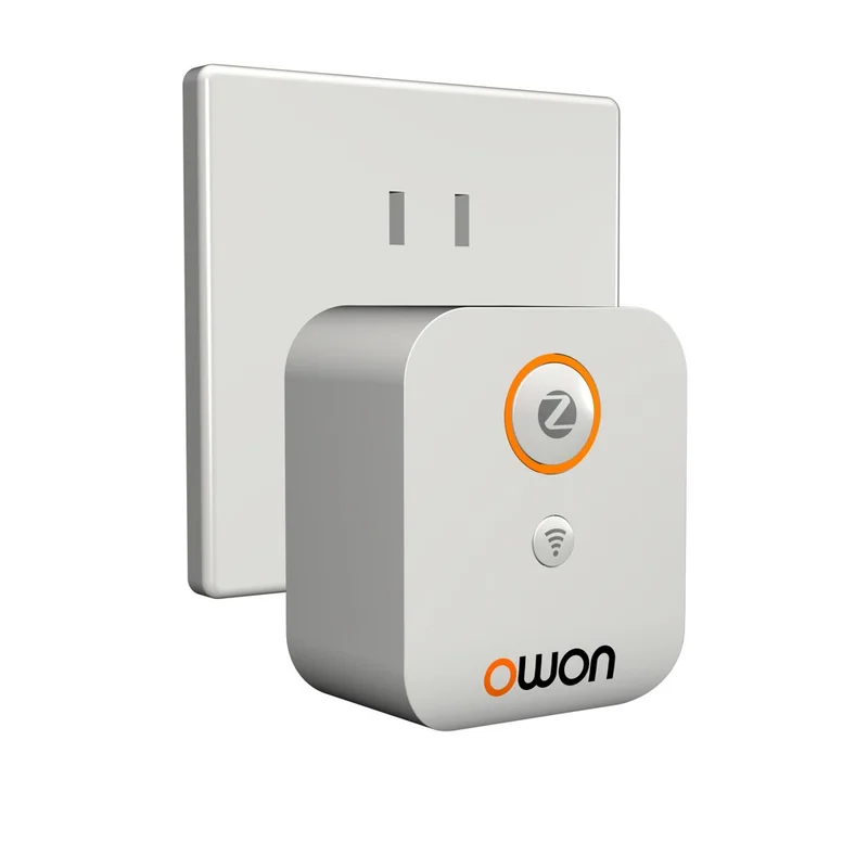 SEG-X3 ZigBee gateway photographed on white next to a US wall plate, owon branding under the button