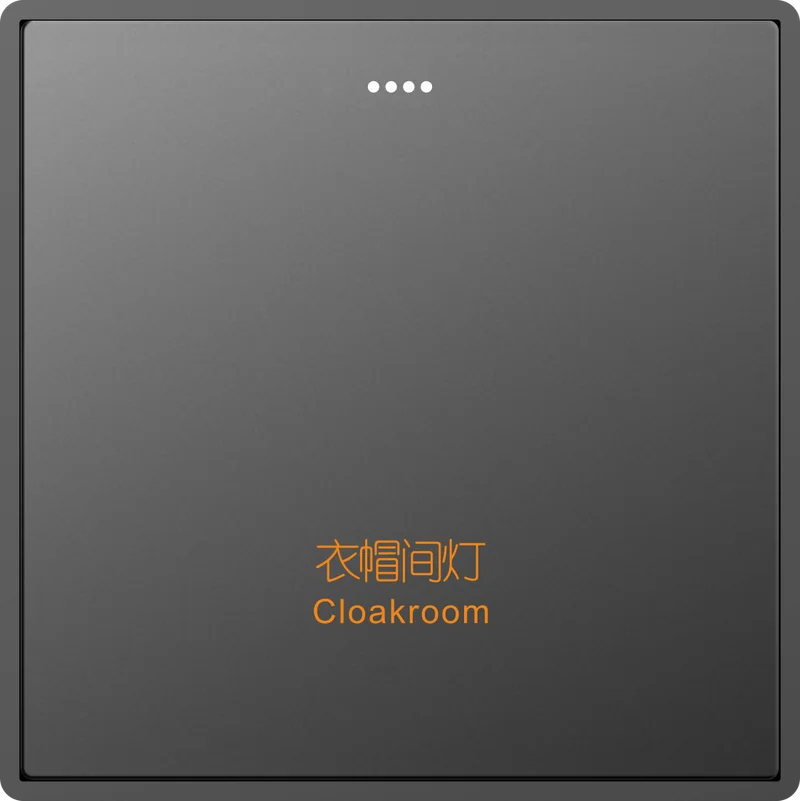 SLC600-D dimmer switch faceplate in dark grey with four white LED dots and the backlit label "Cloakroom" glowing orange