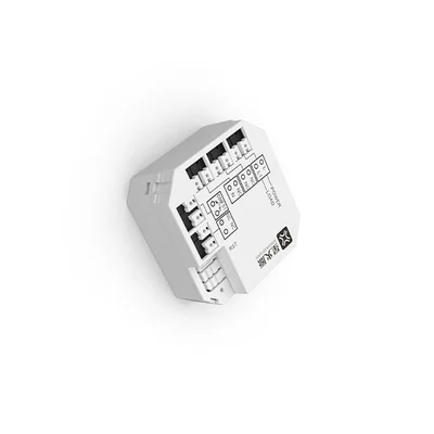SLC631 lighting relay, a white in-wall module photographed at an angle showing its black terminals and printed wiring label